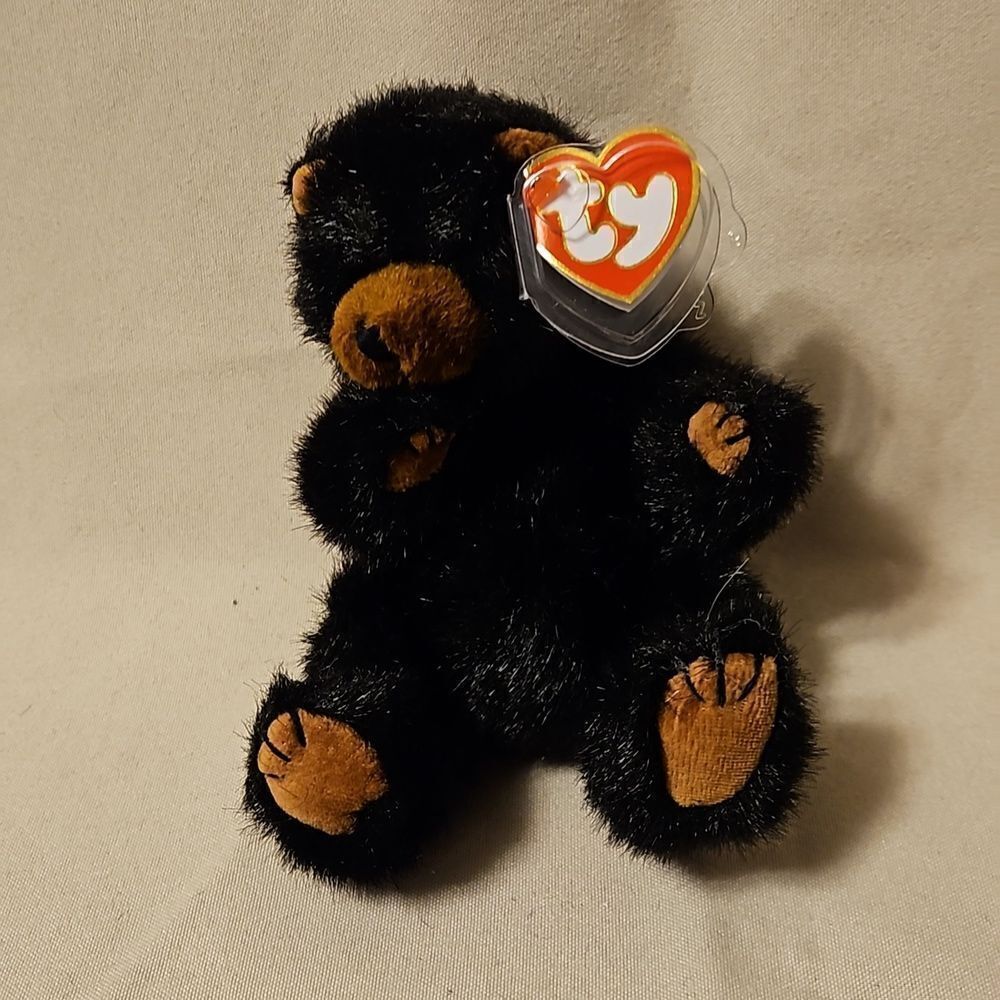 Attic treasure beanie baby, with tag 3rd edition. Ivan Black bear